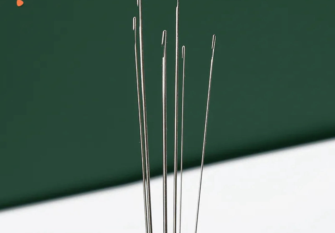 Needles in Glass Tube