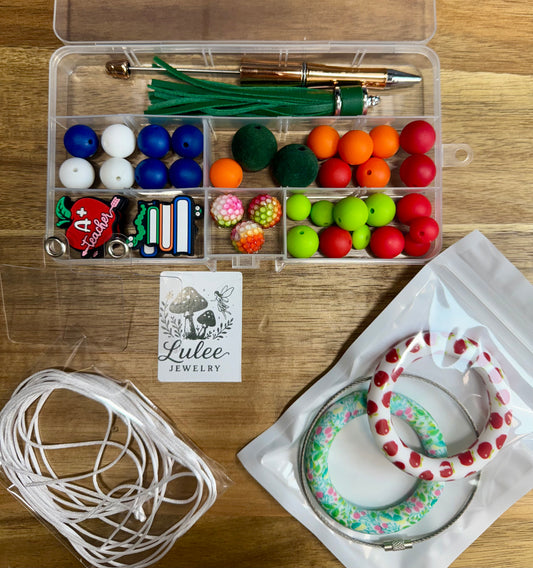 Pen/wristlet/car charm kit